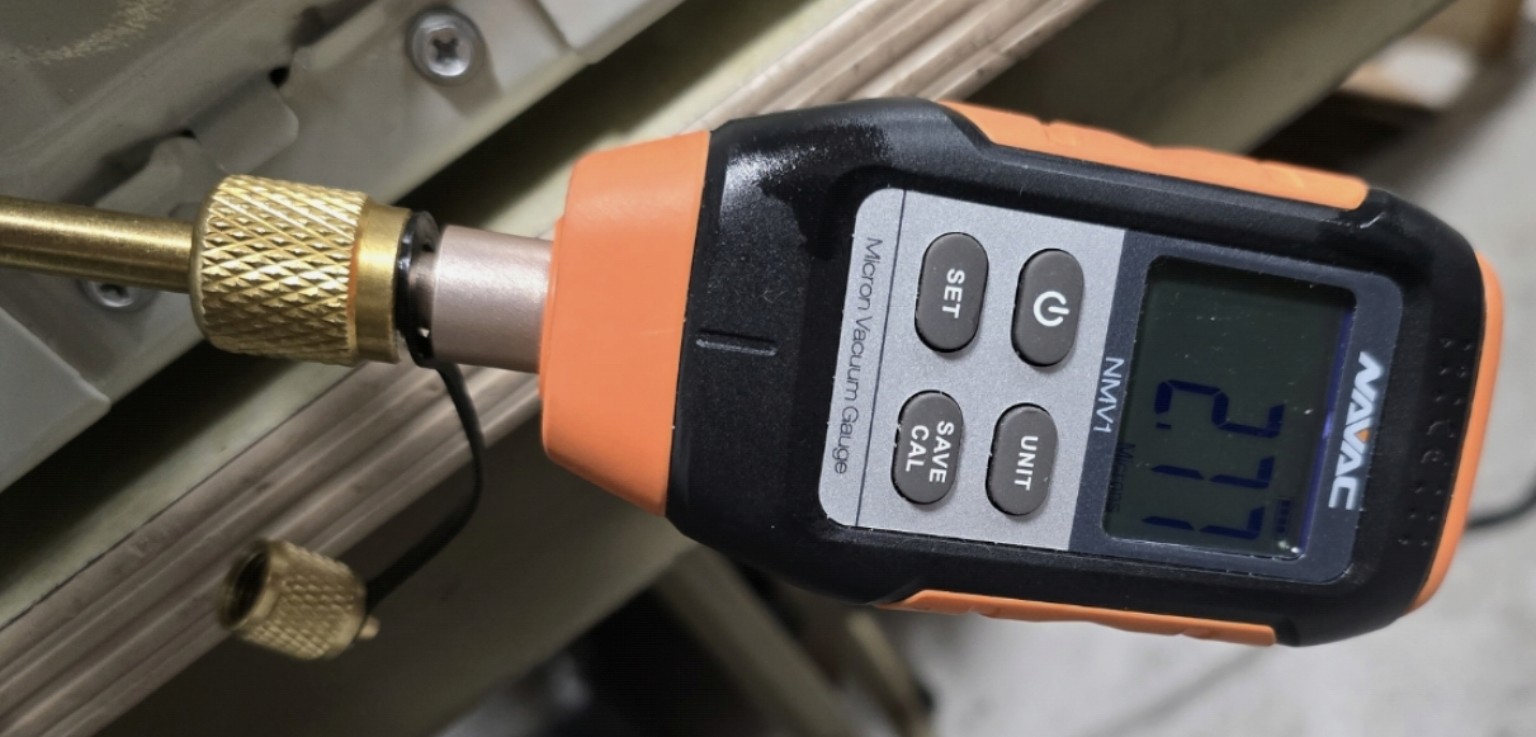 Micron gauge showing a deep vacuum reading