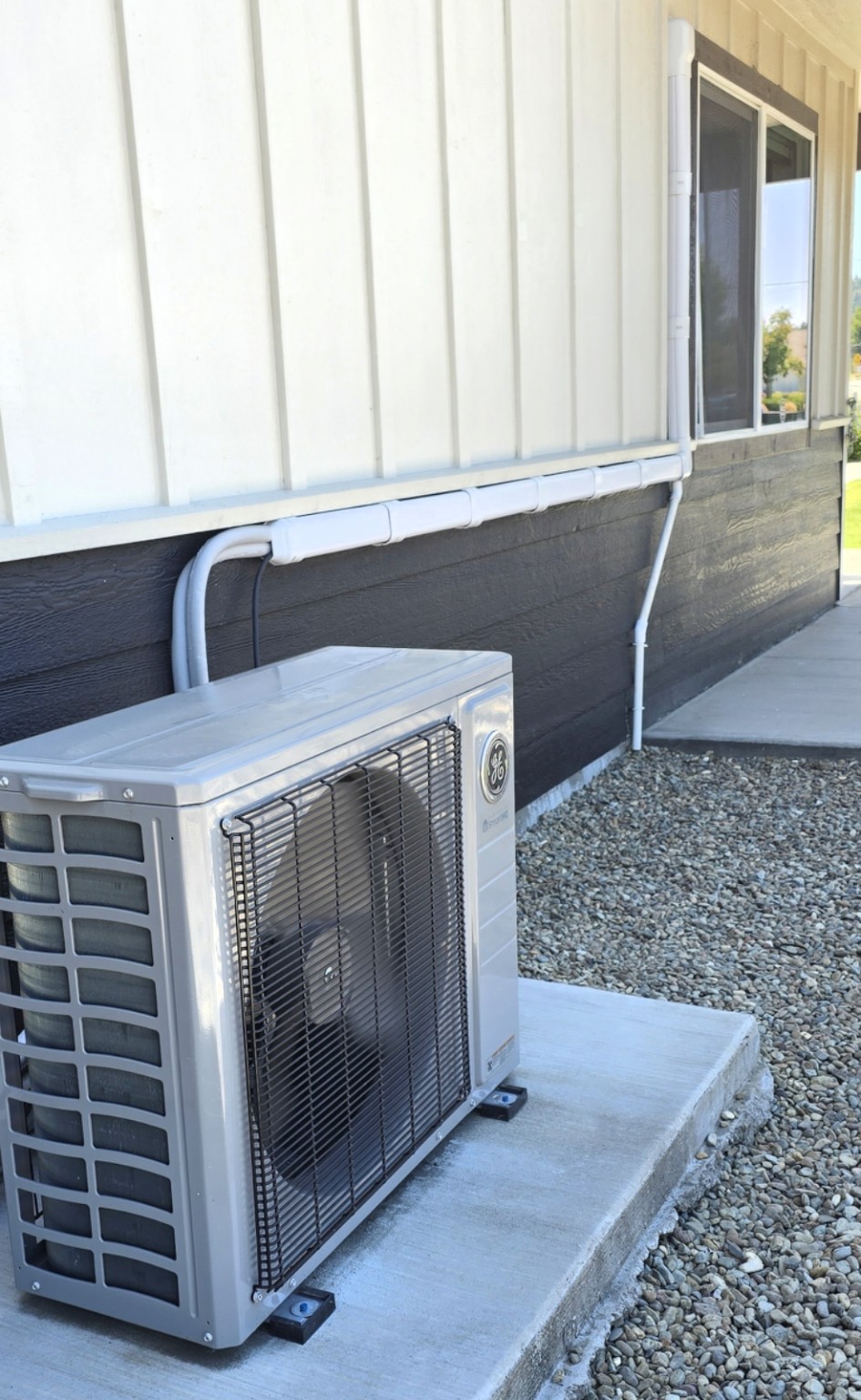 Finished mini-split condenser and line-hide installation