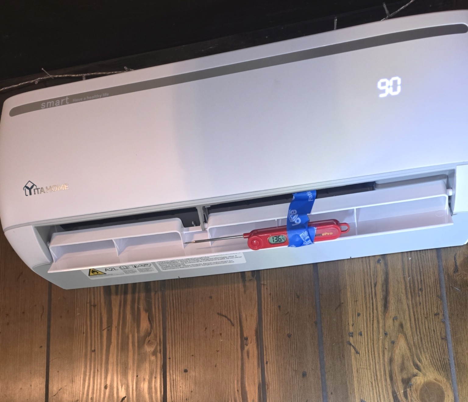 Thermometer showing 136.4 degree heating output
