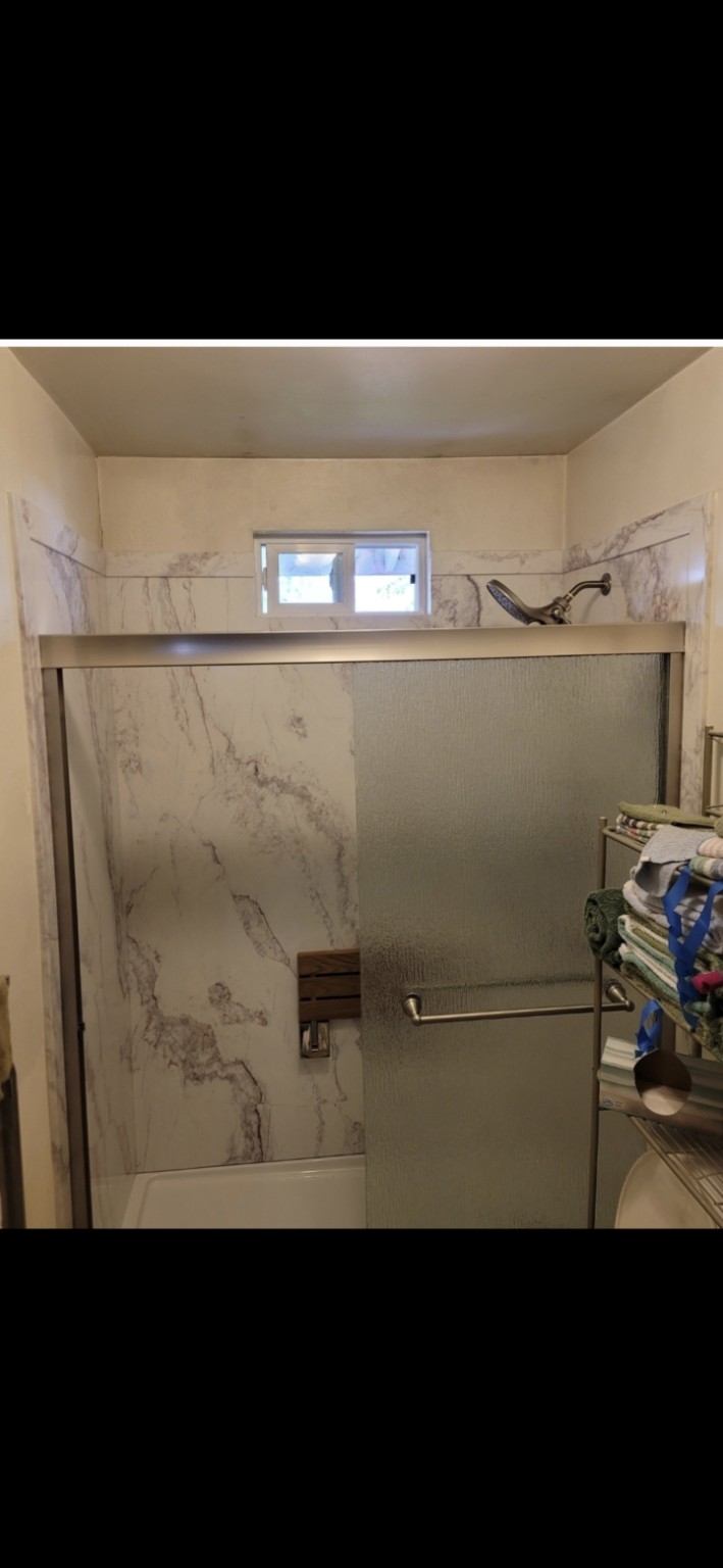 FlexStone walk-in shower with sliding glass door